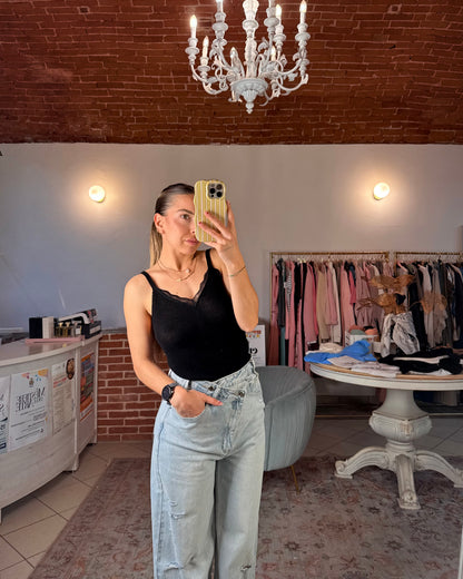 Jeans chiusura asimmetrica