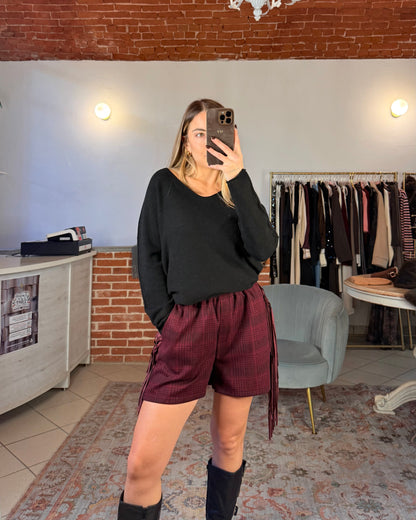 Pantaloncino in panno con frange