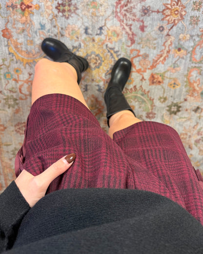 Pantaloncino in panno con frange