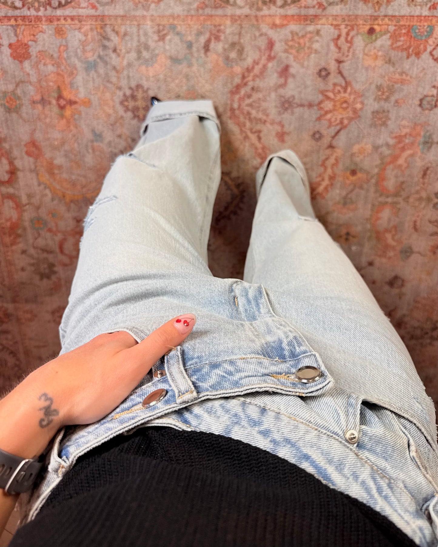 Jeans chiusura asimmetrica
