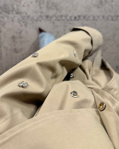 Trench con applicazioni