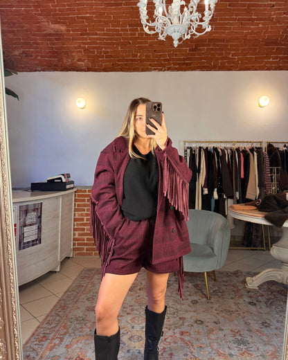 Pantaloncino in panno con frange