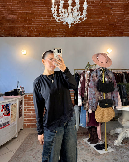 Maglia asimmetrica con pizzo